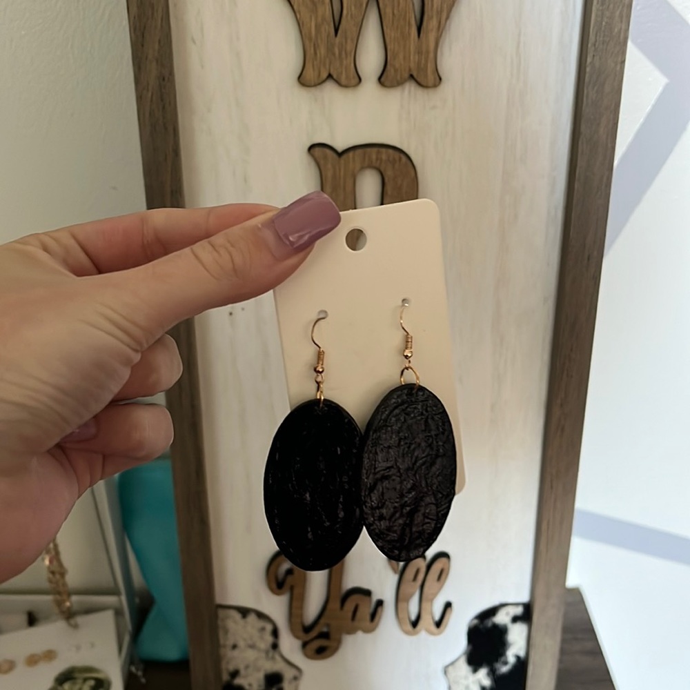 Small boutique earrings never worn